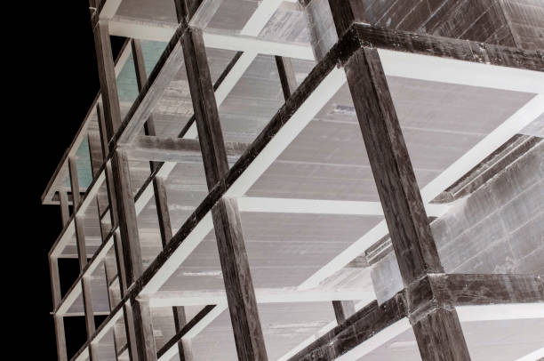 istock reinforced concrete structure of building under construction, solarized black and white photo 1446654629