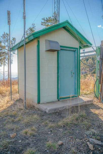 istock Mount Lemmon, Arizona- Small shed surrounded by metal posts with cables 1446660076