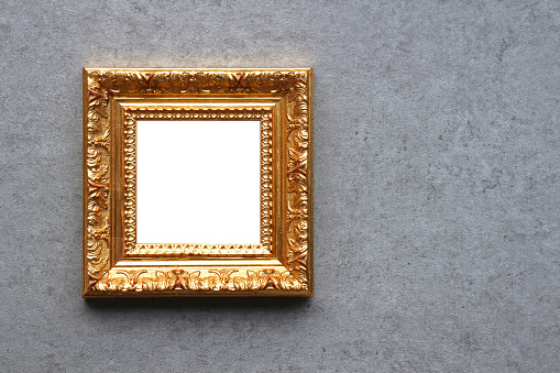 A gold empty frame with room for your image.