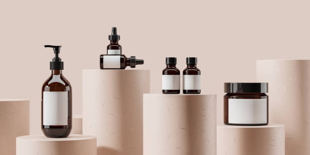 istock Cosmetic bottles set on beige podium. Mockup label 1446661724
