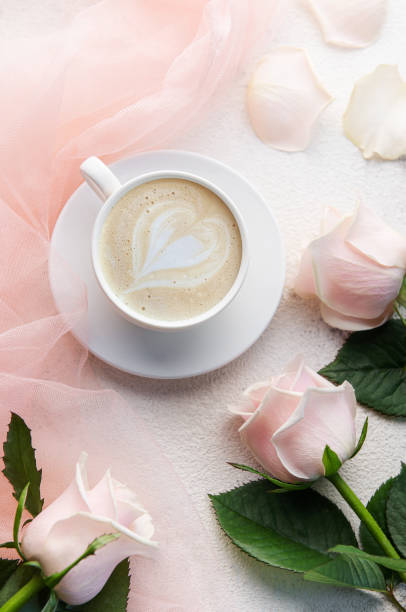 istock Composition with coffee and pink rose flowers. 1446663171