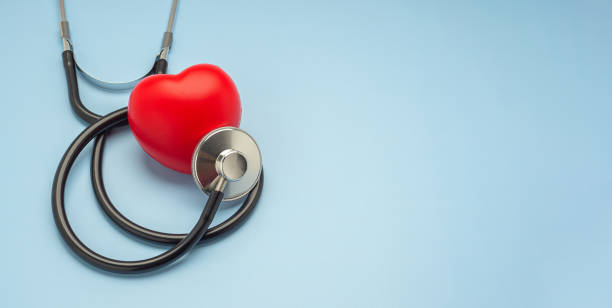 istock A stethoscope and a red heart on a light blue background 1446668667