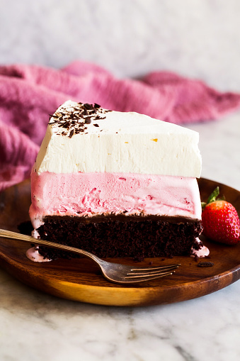 Ice Cream Cake with Strawberry and Vanilla Flavor and Brownie as a cake