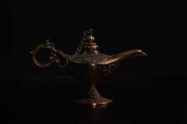 istock Aladdin's magic lamp isolated on black background 1446671065