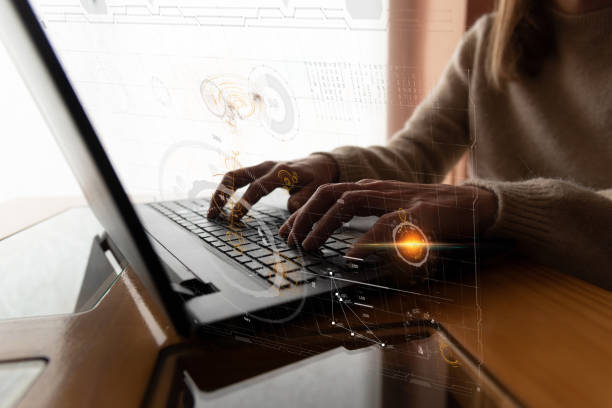 istock Woman typing on computer, futuristic background 1446673186