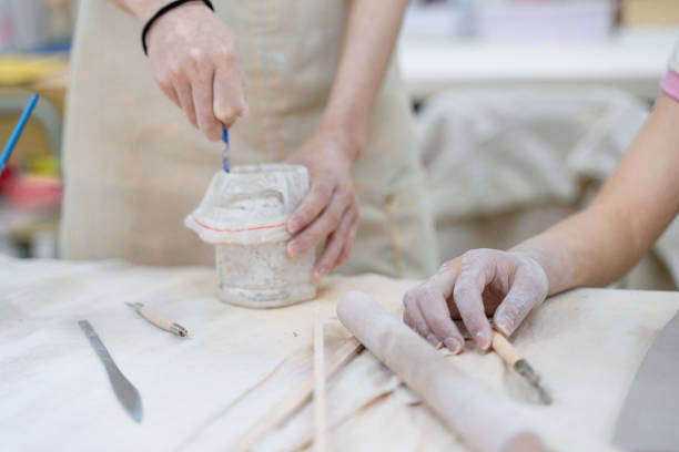 istock A girl who is making clay pots 1446676268