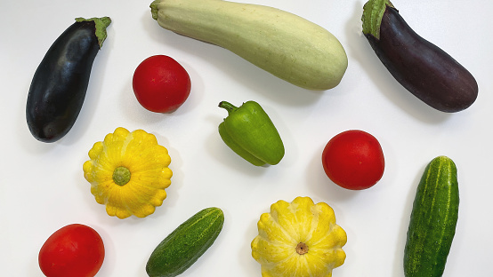 Set of vegetables isolated on a white background, eggplant, zucchini, tomatoes, peppers, cucumbers. Healthy food concept.