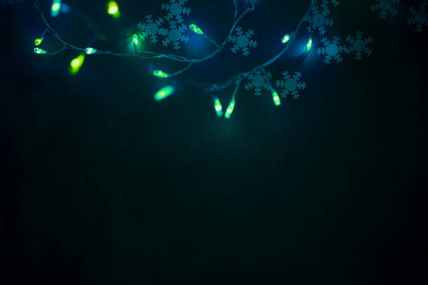 istock Dark Christmas Background with Green Lights Border 1446683966