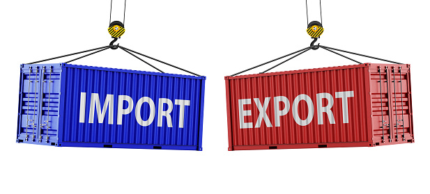 Import and Export concept. Port crane lift two cargo containers with import and export words. Global trade, distribution and logistics.