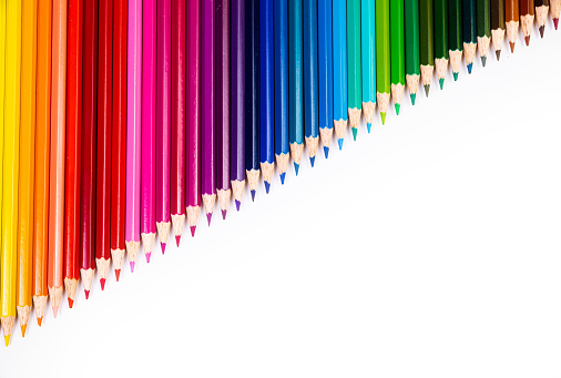 image of colored pencils on a white background
