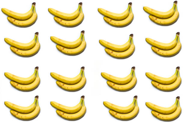 istock a pattern of bananas on a white background, a bunch of bananas. 1446692283