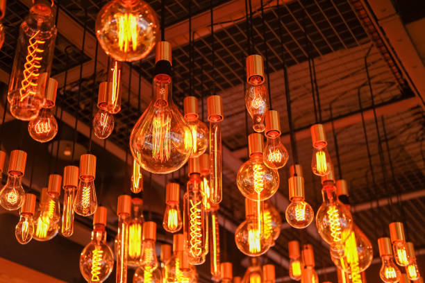 istock Various styles of filament light bulb, hanging on the ceiling 1446692405