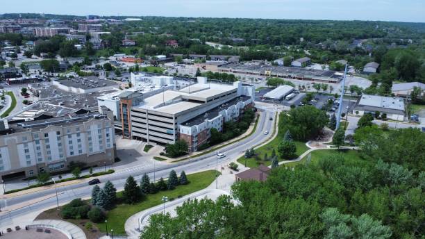 istock Bird's eye view of the building complex surrounded by greenery on a sunny day 1446693528