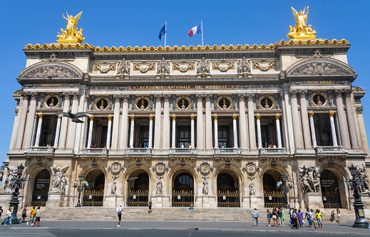 Paris, France - July 17th 2022: View of the principal façade of the Palais Garnier from the Place de l'Opéra