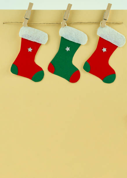 istock Handmade Creative Christmas greeting card with colorful socks 1446699766