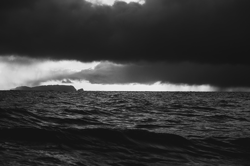 View on a rough sea, with waves of the open ocean from a boat. Dramatic landscapes of the Atlantic Ocean.