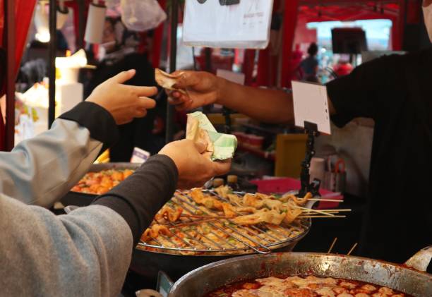 istock people buying food 1446704413