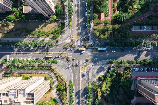 istock Aerial view of intersection traffic under sunlight 1446705119