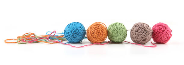 istock Colorful cotton thread balls isolated on white background. 1446706204