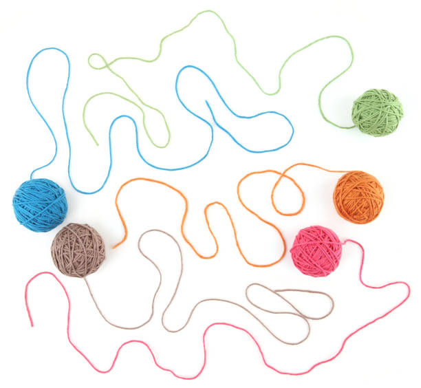 istock Colorful cotton thread balls isolated on white background. 1446706273