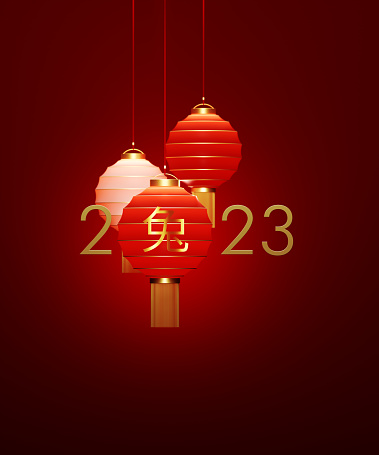 2023 year of the rabbit message over red Chinese lantern on red background. Chinese Lunar Year concept. Horizontal composition with copy space.