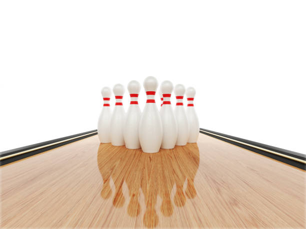 Bowling Concept - Bowling Pins In The Bowling Alley Bowling pins in the bowling alley on white background. Horizontal composition with copy space. Bowling concept. bowling alley wood stock pictures, royalty-free photos & images