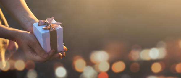 istock Gift, Opening, Women, Giving, Birthday Present,2023,2022 1446710389