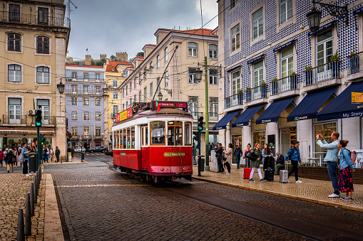 Lisbon, Portugal - October 31, 2022: red tram in the streets of Lisbon