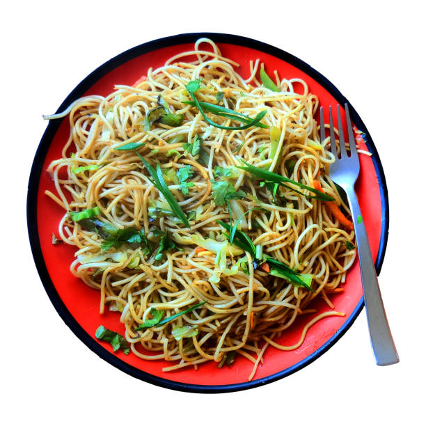 Vegetables Chow mein on the white background, Chow mein is a dish of Chinese stir-fried noodles with vegetables. stock photo