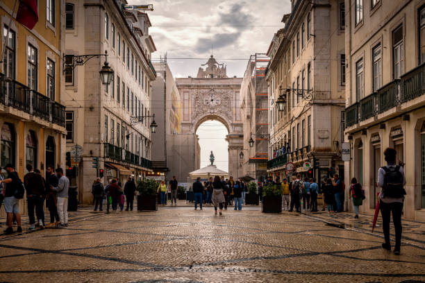 Lisbon, Portugal - October 31, 2022: View along Rua Augusta shopping street in Lisbon in Portugal. At the end is Arco da Rua Augusta.