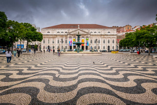 Lisbon, Portugal - October 31, 2022: Rossio square with fountain in Lisbon. Lisbon is the capital of Portugal.