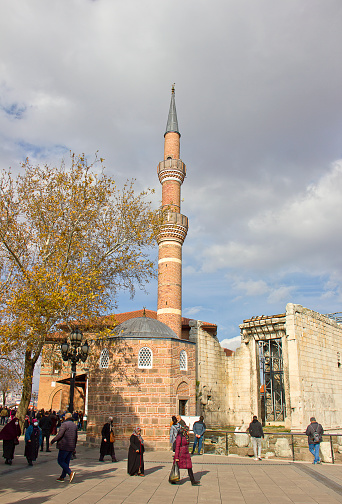 Ankara, Turkey - November 27, 2022: A day view of old bazaar that called Hacı Bayram Veli. Hacı Bayram Mosque and bazaar was built by Architect Mehmet Bey in Ankara, Turkey in 1427. Today people visit the building for shopping and praying.