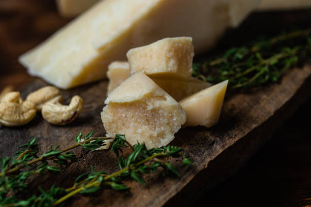 istock Parmesan cheese on a dark background close-up 1446717742