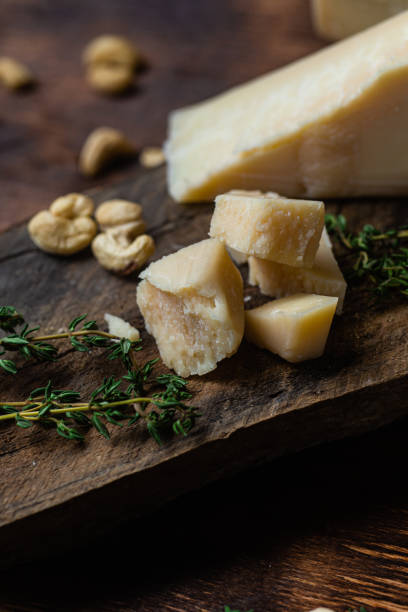 istock Parmesan cheese on a dark background close-up 1446717815