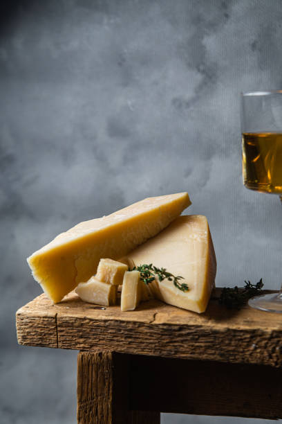 istock Parmesan cheese on a dark background close-up 1446718546