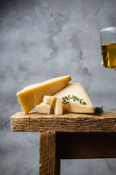 istock Parmesan cheese on a dark background close-up 1446718625