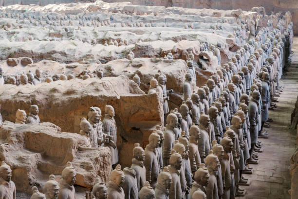 The Terracotta Army warriors at the Mausoleum of sculptures depicting the armies of Qin Shi Huang, the first Emperor of China Xian, China - Feb 9, 2022 : The Terracotta Army warriors at the Mausoleum of sculptures depicting the armies of Qin Shi Huang, the first Emperor of China terracotta soldiers stock pictures, royalty-free photos & images