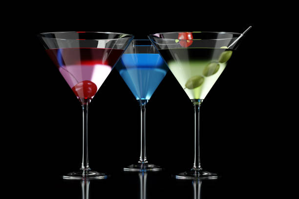 istock Different cocktails in martini glass on black background 1446720194