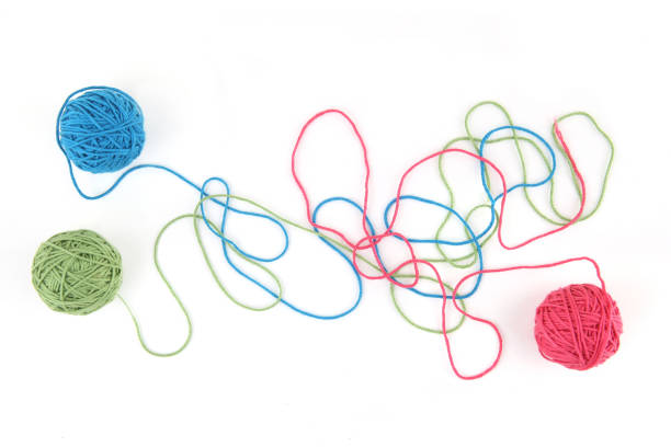 istock Colorful cotton thread balls isolated on white background. 1446724467