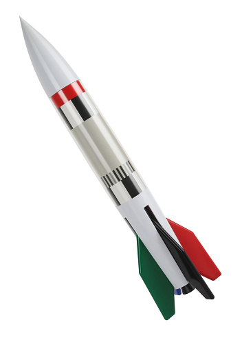 This is a red gray green black rocket isolated on white background.