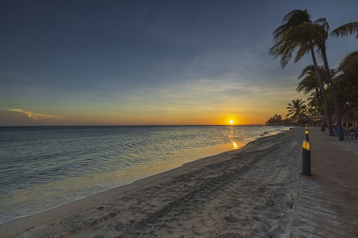 Amazing sunset view of from hotel beach of Aruba Island. Caribbean.