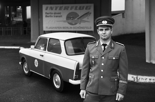 Black and White image taken in the 50s of a young man looking at the camera