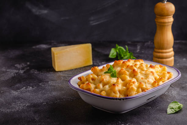 istock American mac and cheese, macaroni pasta in cheesy sauce 1446733858