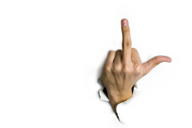 指の手のシンボルのコンセプト ジェスチャーの中指サインは、あなたをファックするか、白で隔離されたファックオフを意味します - fuck you ストックフォトと画像