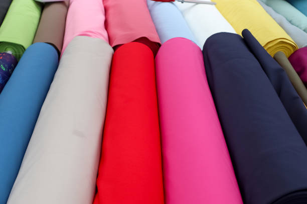 istock Detailed close up view on samples of cloth and fabrics in different colors found at a fabrics market 1446737847