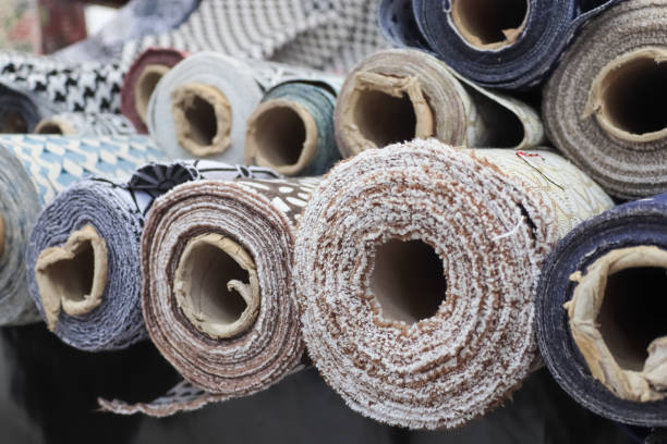 istock Samples of cloth and fabrics in different colors found at a fabrics market 1446737985