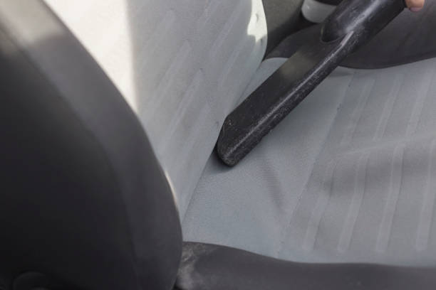 istock Vacuum cleaning car seat 1446739067