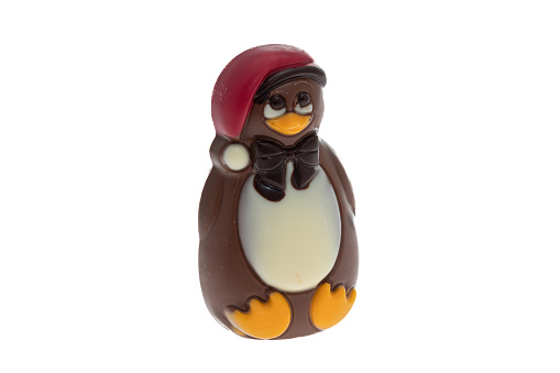 Milk chocolate christmas penguin character figurine - white background