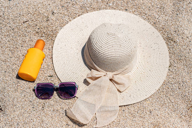 istock Background with summer hat, sunglasses and tanning cream 1446741295