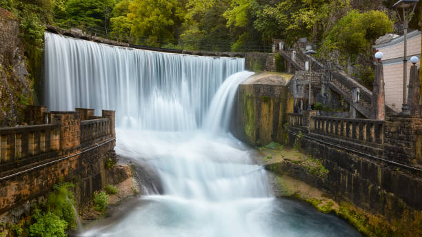 istock The most beautiful waterfall in New Athos surrounded by ancient walls. 1446742138